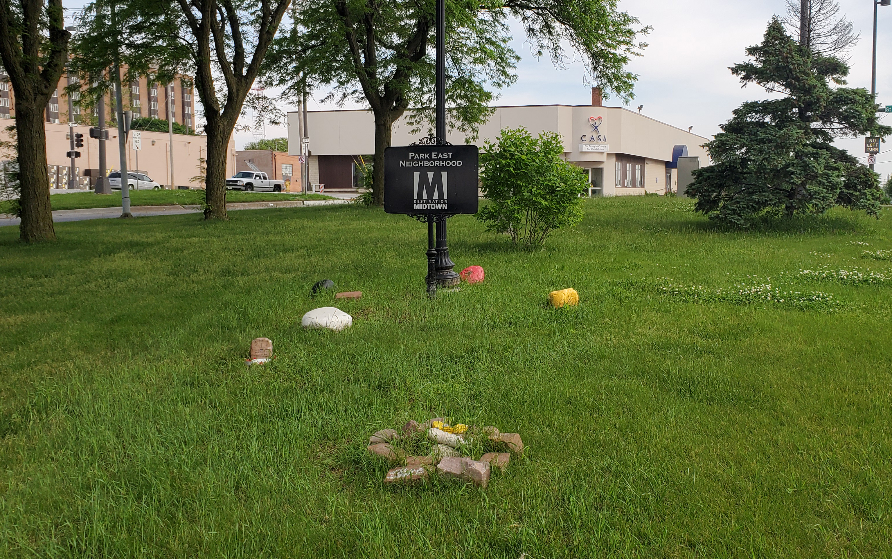 Native American Stone Circle and Park East Neighborhood sign.